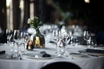 Beautiful table set for an event party or wedding reception . restaurant interior