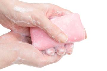 Fototapeta premium Antibacterial soap in the hands. Hand disinfection with soap. Cleanliness and hygiene in everyday life. Hand hygiene
