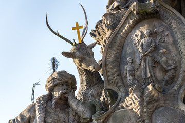 Baroque sculpture of John of Matha, Felix of Valois and Saint Ivan on the Charles Bridge, Prague, Czech Republic, sunny day