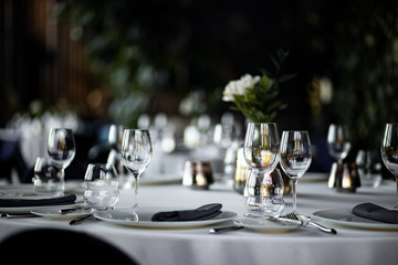 Beautiful table set for an event party or wedding reception . restaurant interior
