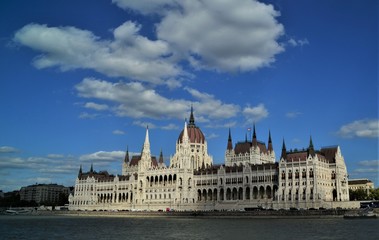 Fototapeta premium parliament of budapest on the danube blue sky