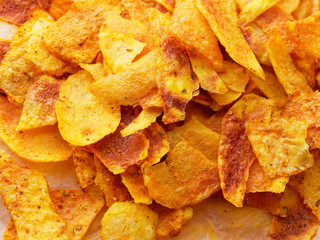 Homemade Chips. A pile of crisps close-up. Junk food.