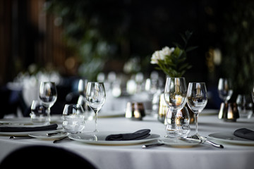 Beautiful table set for an event party or wedding reception . restaurant interior