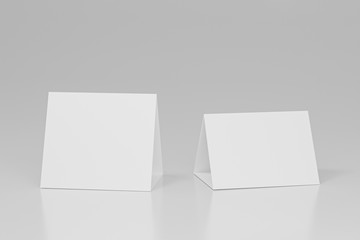 Promotional table talker isolated on white background, mockup template paper tri-fold vertical triangle cards with reflections. white sheets front & left and right view. 3d render
