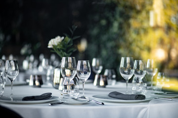 Beautiful table set for an event party or wedding reception . restaurant interior