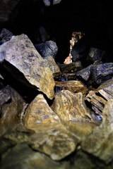 cave with small watercourse in new zealand