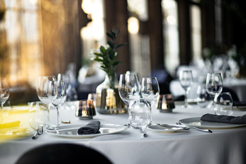 Beautiful table set for an event party or wedding reception . restaurant interior