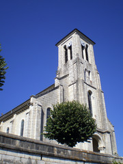 Fototapeta na wymiar Miribel-les-Échelles, France - July 13th 2007 : View of the church Saint-Maurice.