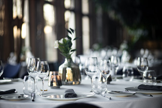 Beautiful table set for an event party or wedding reception . restaurant interior