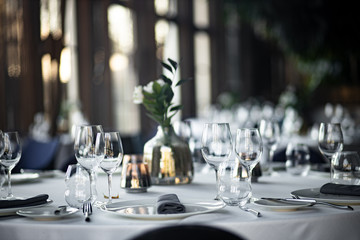 Beautiful table set for an event party or wedding reception . restaurant interior