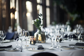 Beautiful table set for an event party or wedding reception . restaurant interior