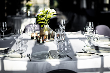 Beautiful table set for an event party or wedding reception . restaurant interior