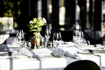Beautiful table set for an event party or wedding reception . restaurant interior