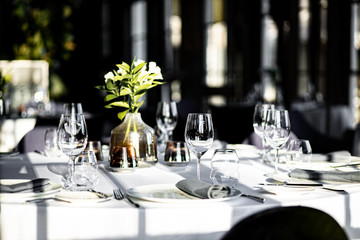 Beautiful table set for an event party or wedding reception . restaurant interior