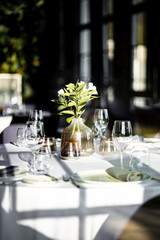 Beautiful table set for an event party or wedding reception . restaurant interior
