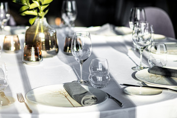 Beautiful table set for an event party or wedding reception . restaurant interior
