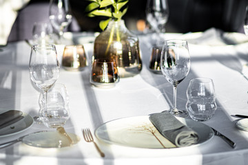 Beautiful table set for an event party or wedding reception . restaurant interior