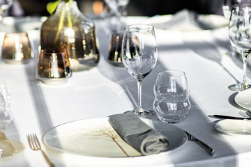 Beautiful table set for an event party or wedding reception . restaurant interior