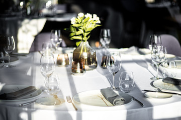 Beautiful table set for an event party or wedding reception . restaurant interior