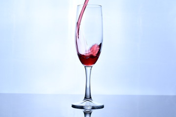 glass of red wine on white background