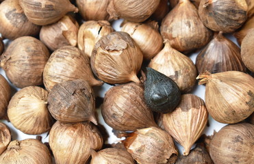 black garlic healthy food arranging on white background