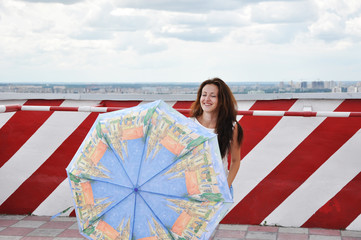 crazy positive childish comic girl holding umbrella. just having fun