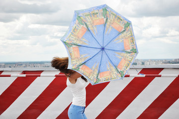 free time and vacation. sunny or rainy weather forecast. just having fun. sexy girl with parasol....