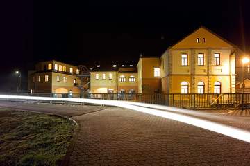 Night and big hotel in the glow of lights