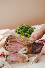 cutting out meat . boiled pork . smoked product . kitchen herbs