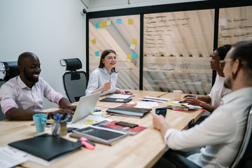 Happy office worker having fun with colleagues