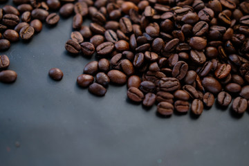 coffee beans are on a black background.