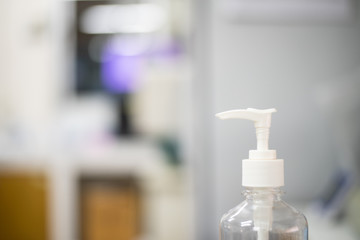Fototapeta na wymiar alcohol gel on blur background with protected coronavirus.