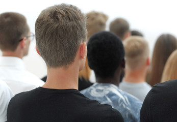 diverse young people built a tower out of their fists