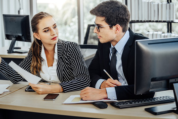 Business people working in a small office