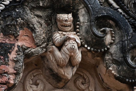 An image of a character from one of the traditional Burmese folk religions, an element of the stupa decoration