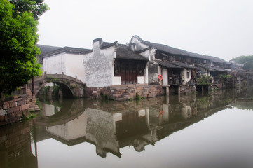 Fototapeta na wymiar wuzhen china water town bridge and buildings