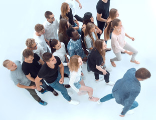 Fototapeta premium top view. a group of young people walking together in a row.