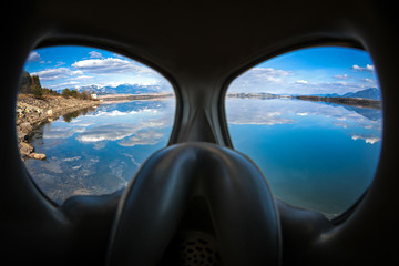 View through protective gas mask in nature. Coronavirus. COVID-1