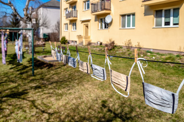 Fototapeta premium Protective face masks on clothesline