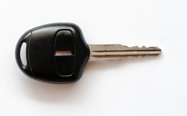 Car keys on a black background.