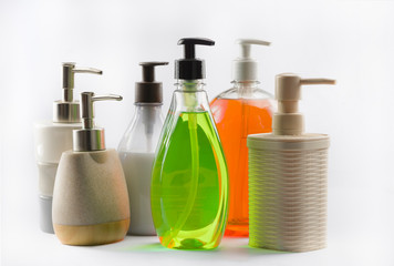 Protection against coronavirus: several bottle soaps with white background