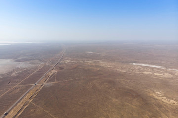 steppe landscape with haze from the lake from the top view