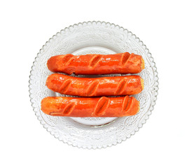 carrots on a plate isolated on white background