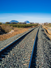 Empty railroad track on countryside in Spain