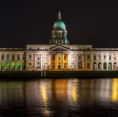 Beautiful night view scene Dublin city center old town Ireland cityscape reflection river Liffey  long exposure The Custom House