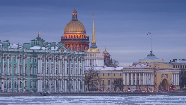 Timelapse of St Isaac's Cathedral with night lights and Neva river ice in St Petersburg, Russia
