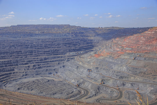 Panorama of iron ore quarry on a sunny day
