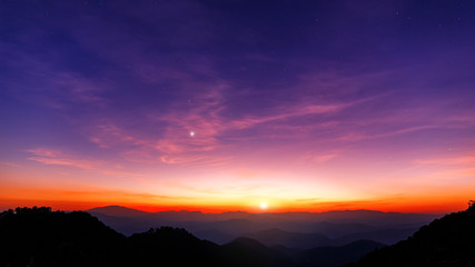 Majestic sunset sky over the mountains landscape