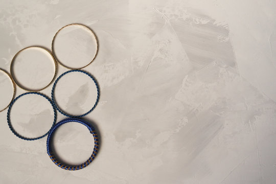  Round metal bracelets on a gray background