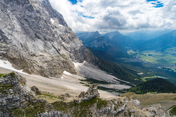 Fototapeta na wymiar Beautiful hike and climb to the Zugspitze near Ehrwald and Eibsee, the highest mountain in Germany